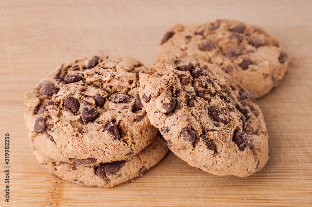 Chocolate cookies on wooden background Chocolate cookies on wooden background