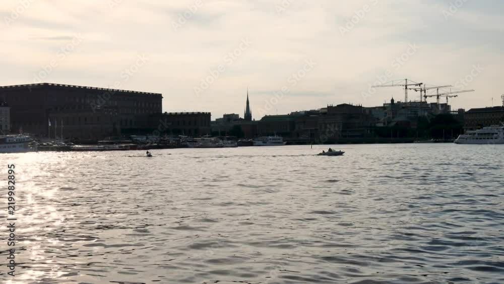 In Stockholm, the capital of Sweden during the summer, people have fun in the historic city centre with jet skis. In Stockholm, the capital of Sweden during the summer, people have fun in the historic city centre with jet skis.