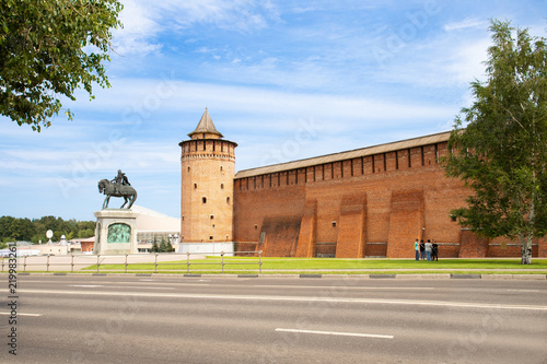 Kolomna, Russia. Kolomna Kremlin. Marinkina Kremlin Tower And Monument To Dmitry Donskoy Under Blue Sky In Sunny Day In Summer.