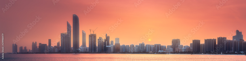 Panorama view of Abu Dhabi Skyline at sunset, UAE