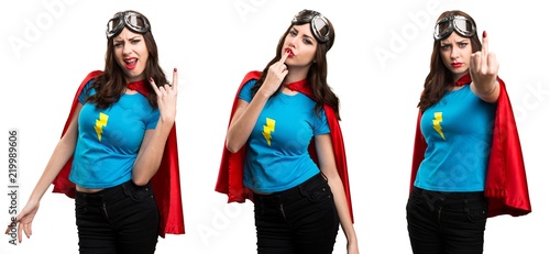 Set of Pretty superhero girl making horn gesture © luismolinero