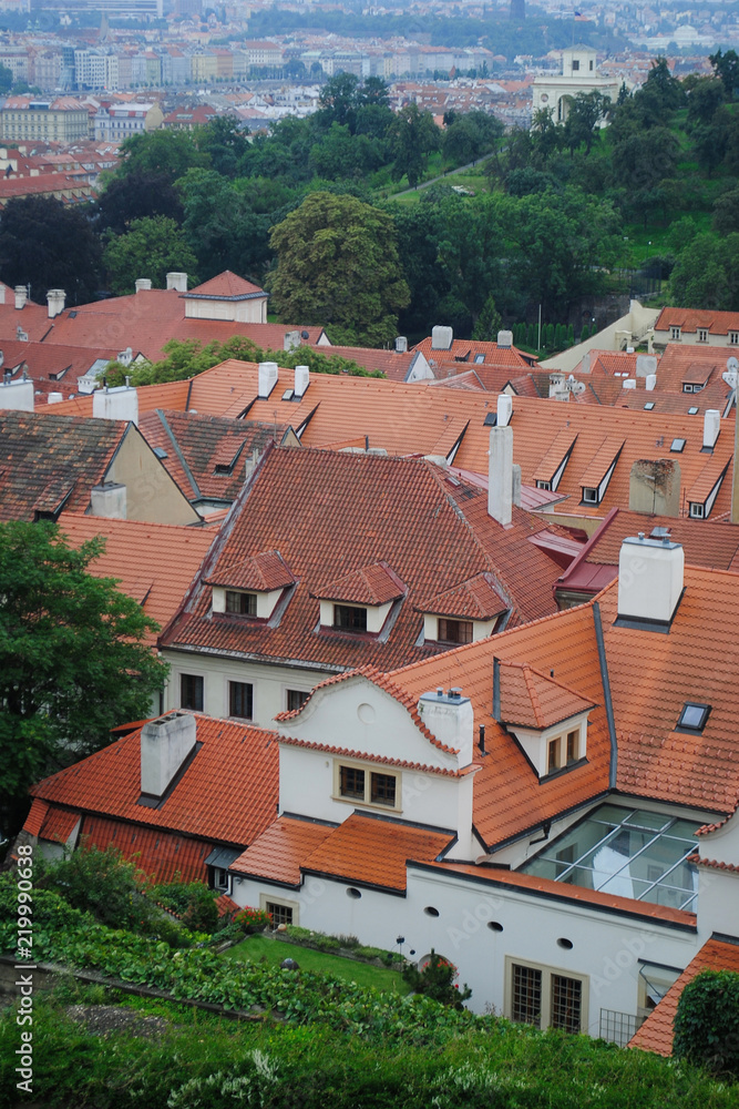 Urban landscape whith orange roofs of Prague