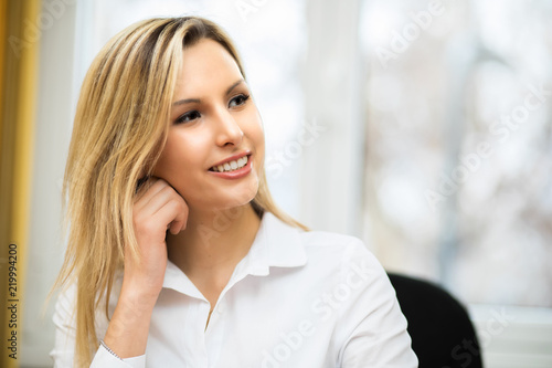 Young thoughtful female manager