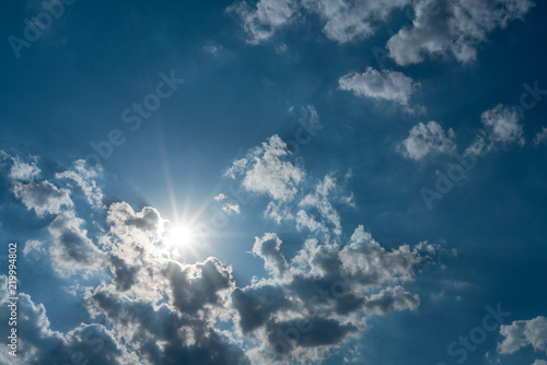 Sun shining through the clouds  heaven background