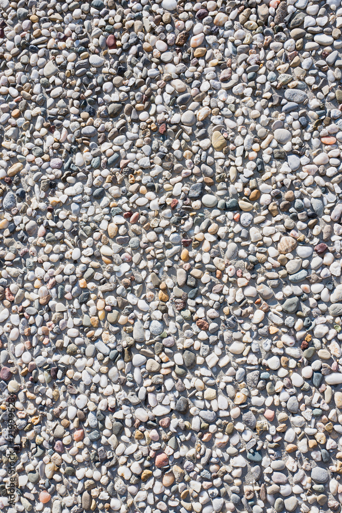 Concrete wall with pebbles. Concrete wall with pebbles.