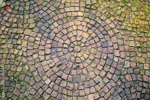 Texture of paving stones on an ancient road