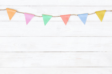 Festive white wooden background with garland