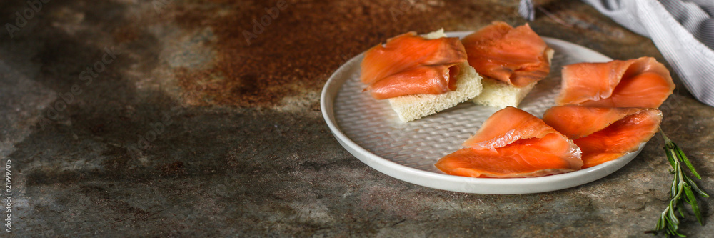 Fresh fish. Salmon fillet on black background. . food background. top view Fresh fish. Salmon fillet on black background. . food background. top view