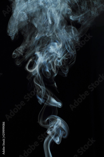 White smoke texture on black background © Yuriy