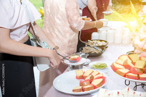 Food Buffet Catering Dining Eating Party Sharing Concept.people group catering buffet food indoor in luxury restaurant with meat colorful fruits and vegetables. coffee break.