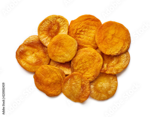Sun dried apricots isolated on white background. Top view.