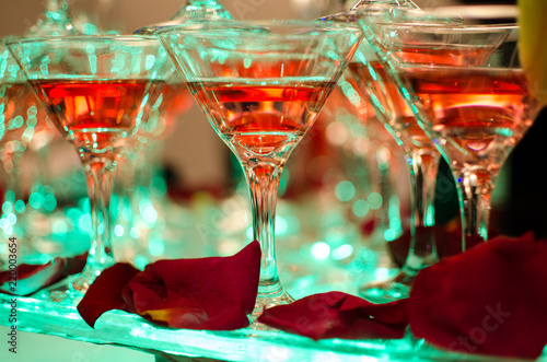 Glasses with cocktails made up in the form of a pyramid