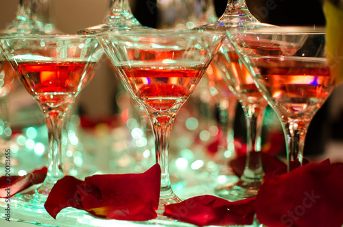 Glasses with cocktails made up in the form of a pyramid