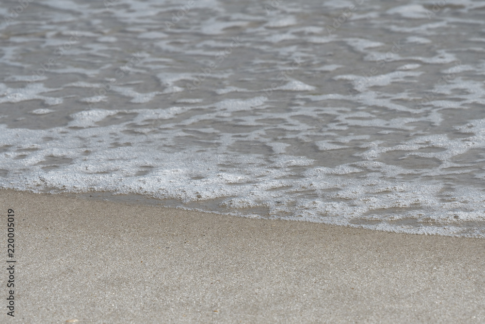 beach border with bubbles in the water beach border with bubbles in the water
