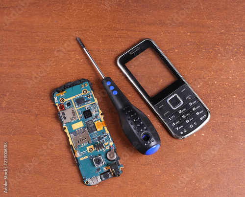 Disassembled broken cell (mobile) phone repair
