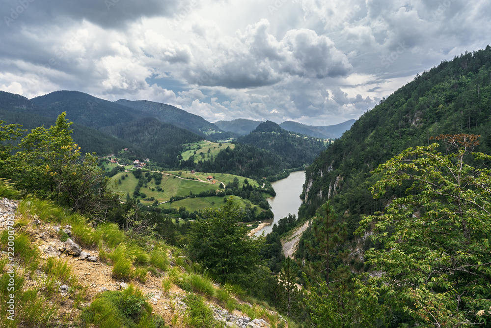 Landscape view of Zaovine and  Spajici lake from the height, and the river Beli Rzav in Tara national park in Serbia in summer day