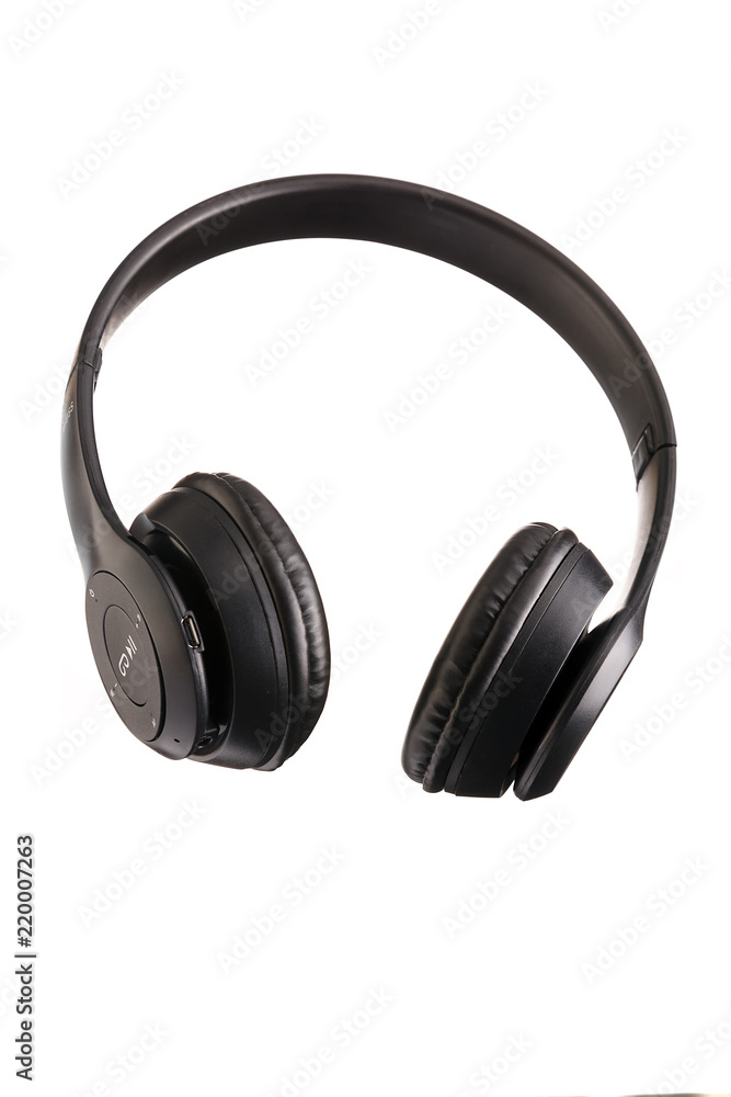 Black wireless headphones. Headphones isolated on white background