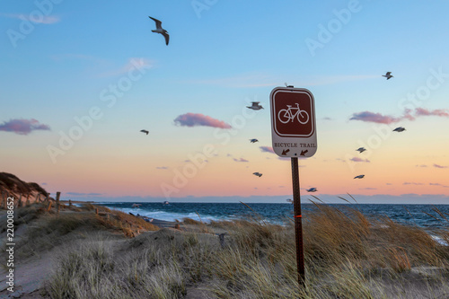 Bike Trail sign on Provincetown at sunset photo