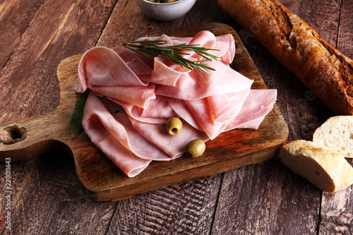 Slika na platnu Sliced ham on wooden background