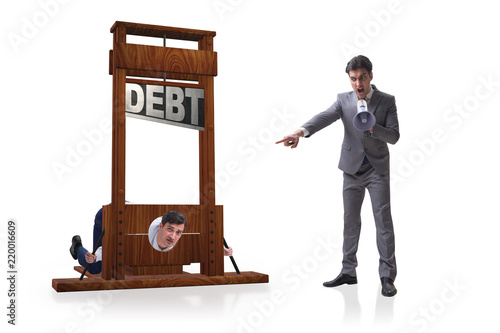 Businessman in heavy debt business concept
