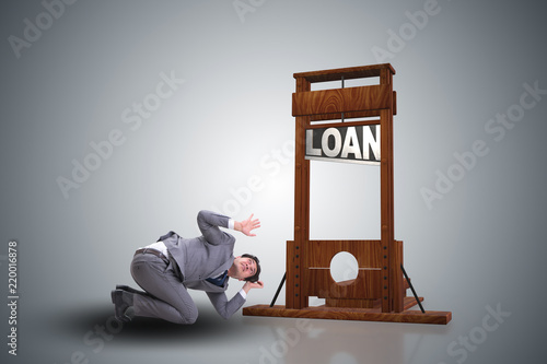 Businessman in debt and loan concept