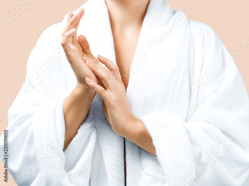 Closeup beautiful woman after bath in white bathrobe