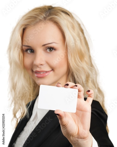 Young Businesswoman Holding a White Placeholder - Isolated