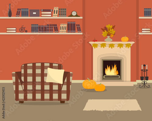 Orange living room with fireplace and checkered armchair. Autumn decor in the interior. The fireplace is decorated with yellow leaves, berries and pumpkins. There are also bookshelves in the picture