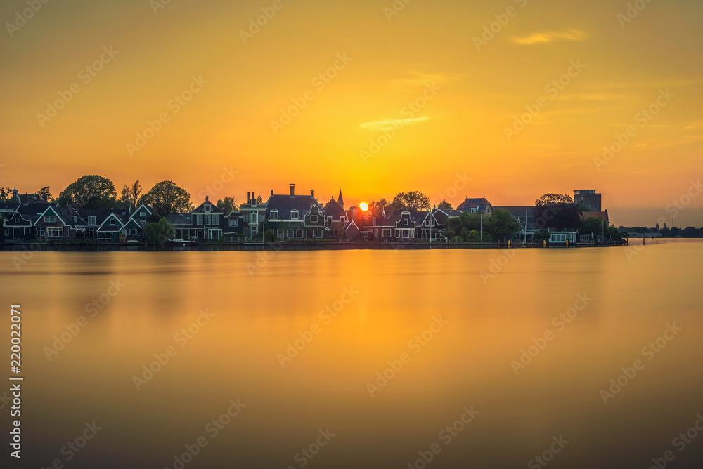 Sunset above the beautiful village of Zaanse Schans in Holland