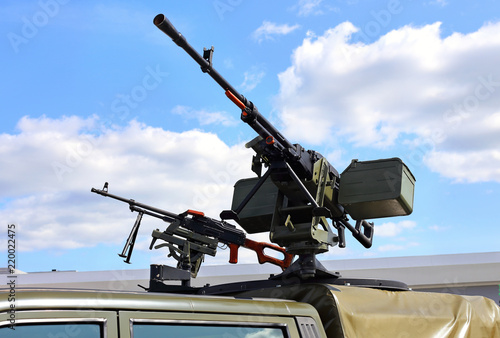 Two machine guns on the roof of the armored car
