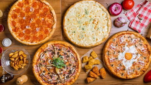 Italian pizzas and snacks top view