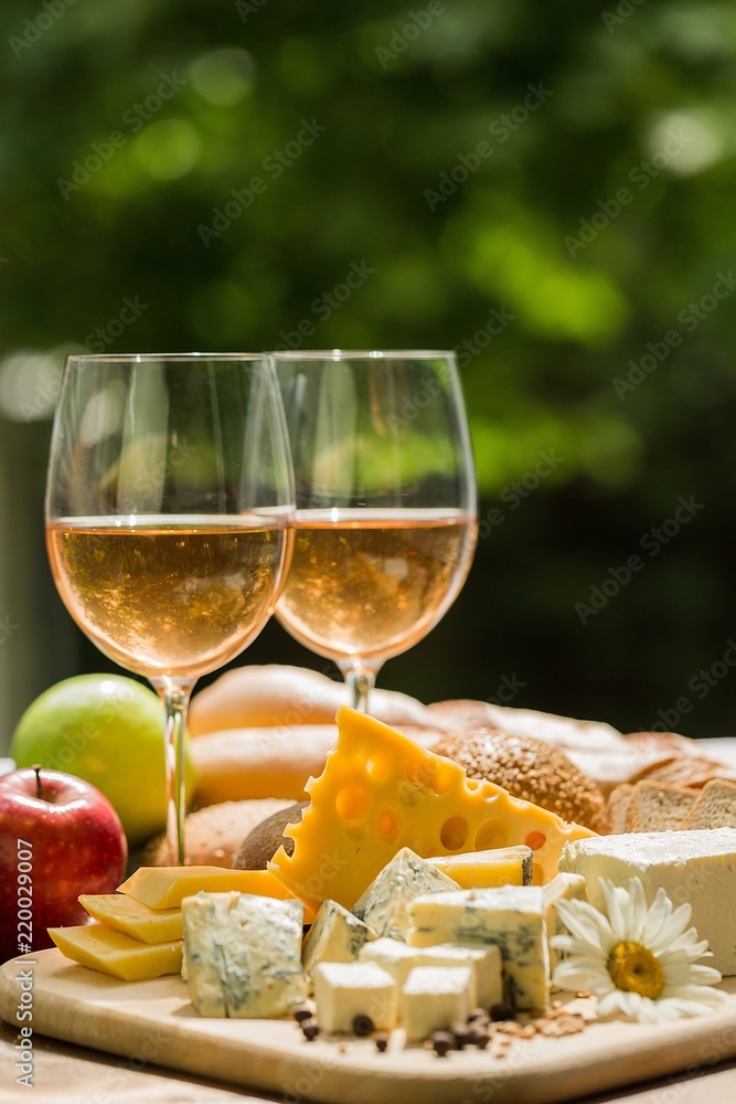 Glasses of Wine with Cheese, Bread and Apples