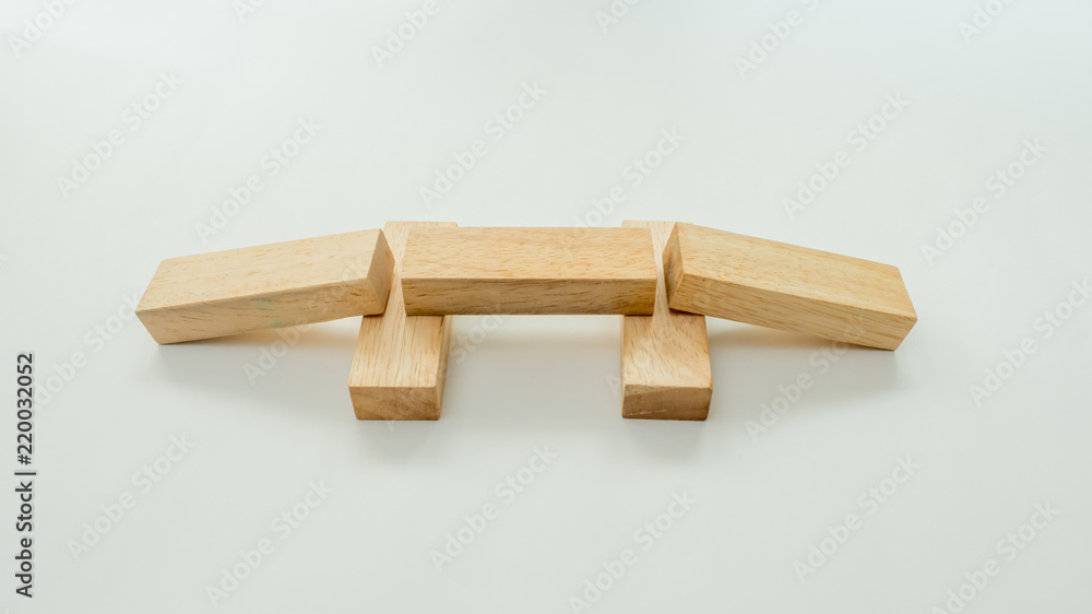 wood block bridge symbol business concept on white background wood block bridge symbol business concept on white background