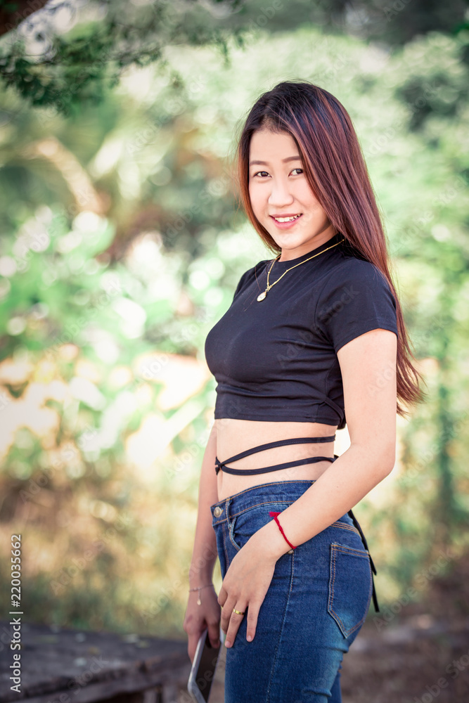 Portrait beautiful asian cute young girl smile on face in nature Portrait beautiful asian cute young girl smile on face in nature