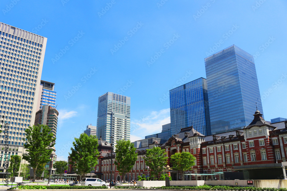 Classical Tokyo station made of brick and new high-rise building Classical Tokyo station made of brick and new high-rise building