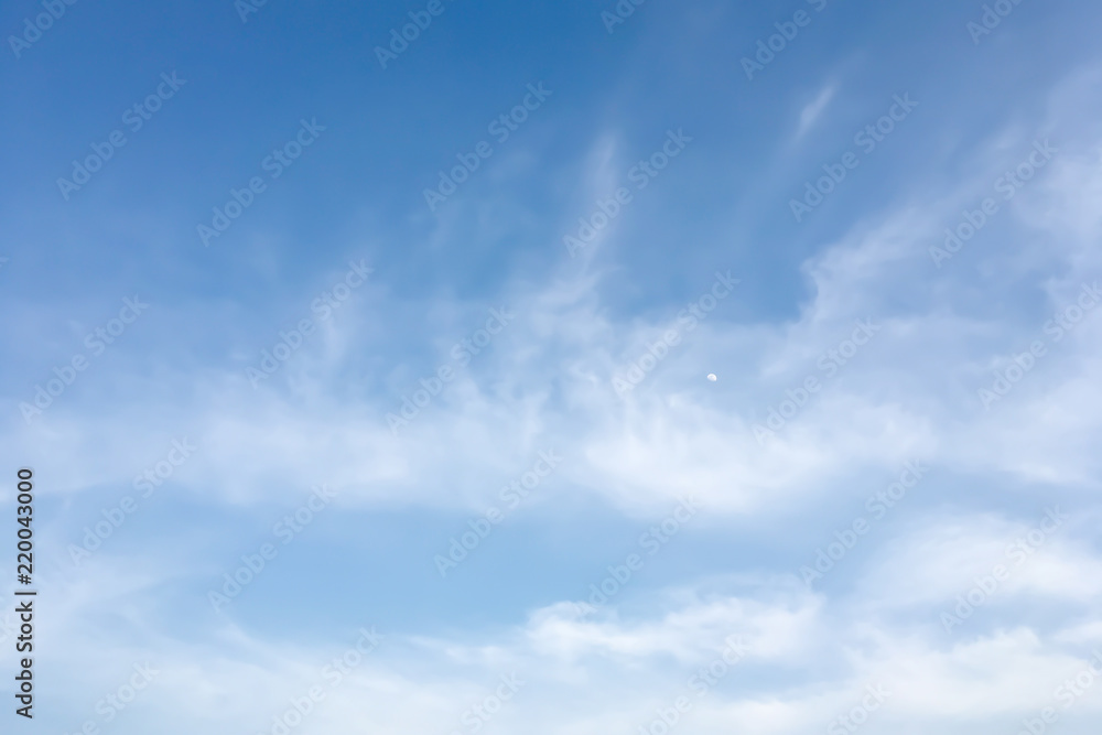 Authentic and dramatic  image panorama atmosphere view of summer blue sky and clouds with moon in outdoor daylight.