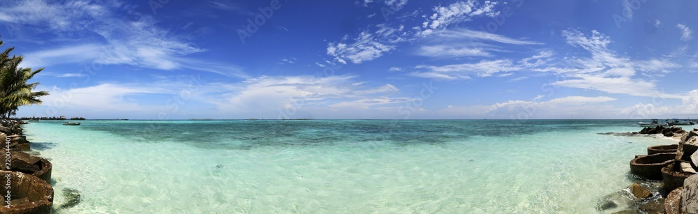 View of tropical island and turquoise water 