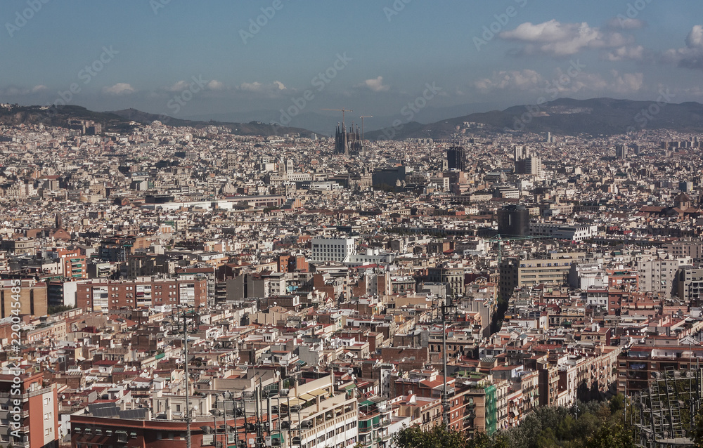 View of city of Barcelona with unfinished Sagrada Familia from Montjuic Castle viewpoint