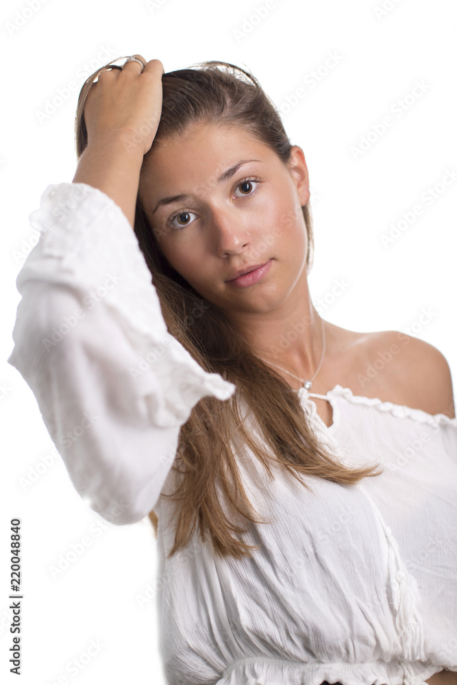 Beautiful girl with long hair and no makeup on a white background Beautiful girl with long hair and no makeup on a white background