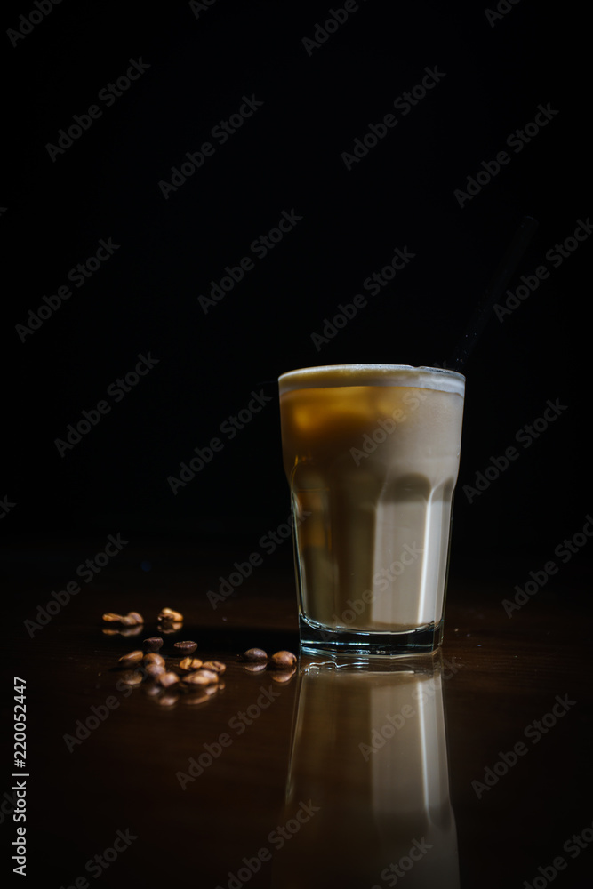 Coffee drinks on a black background. Coffee on a black table. Cold coffee. Latte. Cappuccino. Espresso. Coffee cocktails. Milkshakes. Whipped cream. Barista Coffee drinks on a black background. Coffee on a black table. Cold coffee. Latte. Cappuccino. Espresso. Coffee cocktails. Milkshakes. Whipped cream. Barista