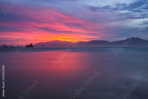Colorful sunset in the beach © Mujibur Rohman