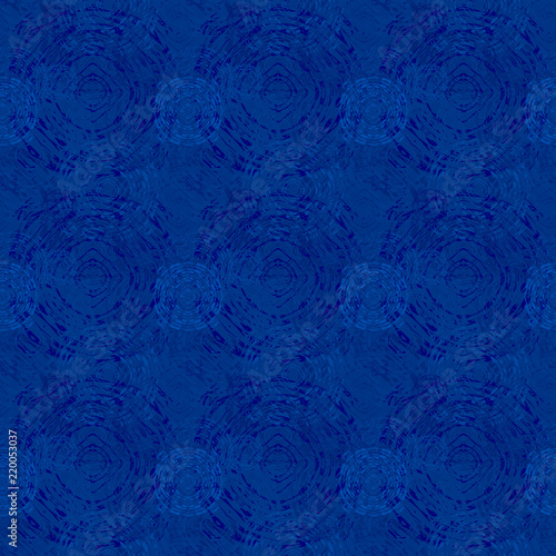 Seamless background pattern with various colored circles.