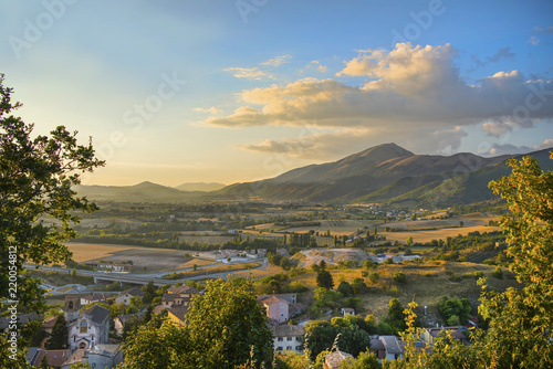 A picturesque view of Monte Cucco from Fossato di Vito in beautiful golden light at sunset. Italy, Umbria.