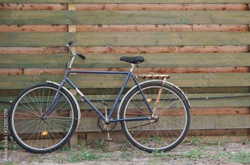 Wooden background with bicycle