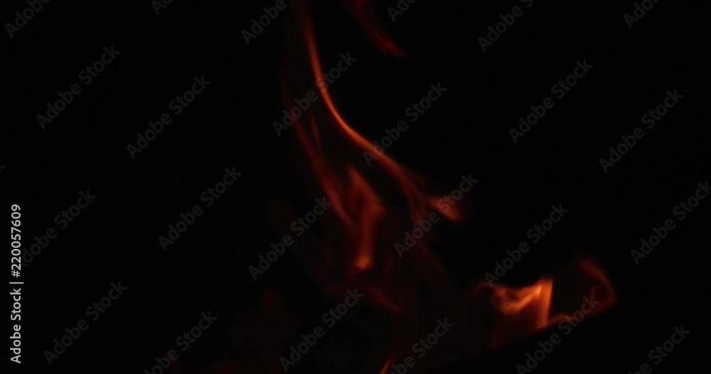 barbecue fire flame closeup slow motion isolated in dark barbecue fire flame closeup slow motion isolated in dark