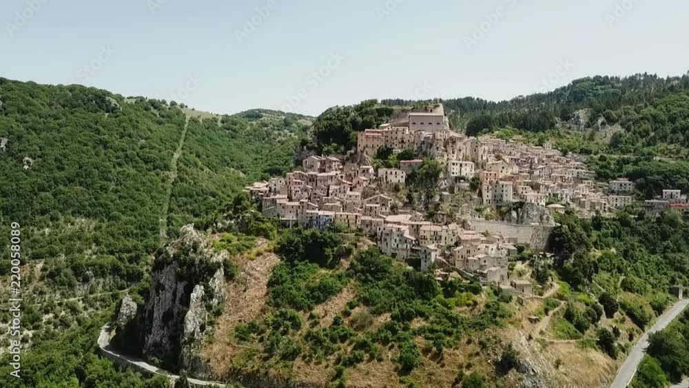 Aerial Panoramic view of Cervara an Ancient medieval village perched on rock spur, with a ruined fortress at the top Aerial Panoramic view of Cervara an Ancient medieval village perched on rock spur, with a ruined fortress at the top