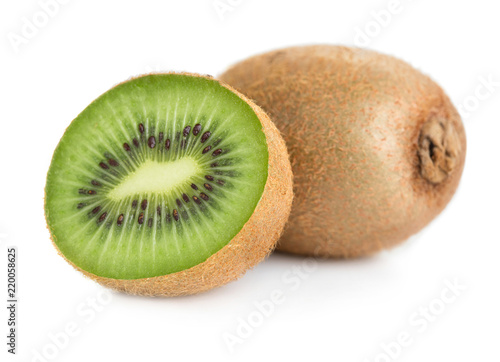 fresh rip kiwi fruits isolated on white background
