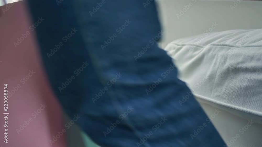 Happy young Asian woman with shopping bags in modern apartment checking purchasings. Happy young Asian woman with shopping bags in modern apartment checking purchasings.