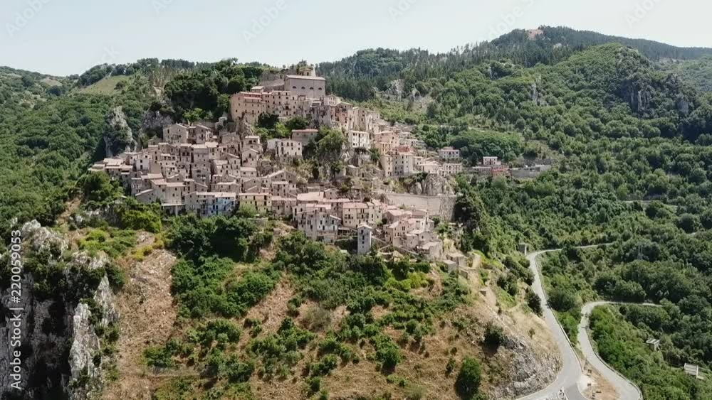 Aerial Panoramic view of Cervara an Ancient medieval village perched on rock spur, with a ruined fortress at the top Aerial Panoramic view of Cervara an Ancient medieval village perched on rock spur, with a ruined fortress at the top