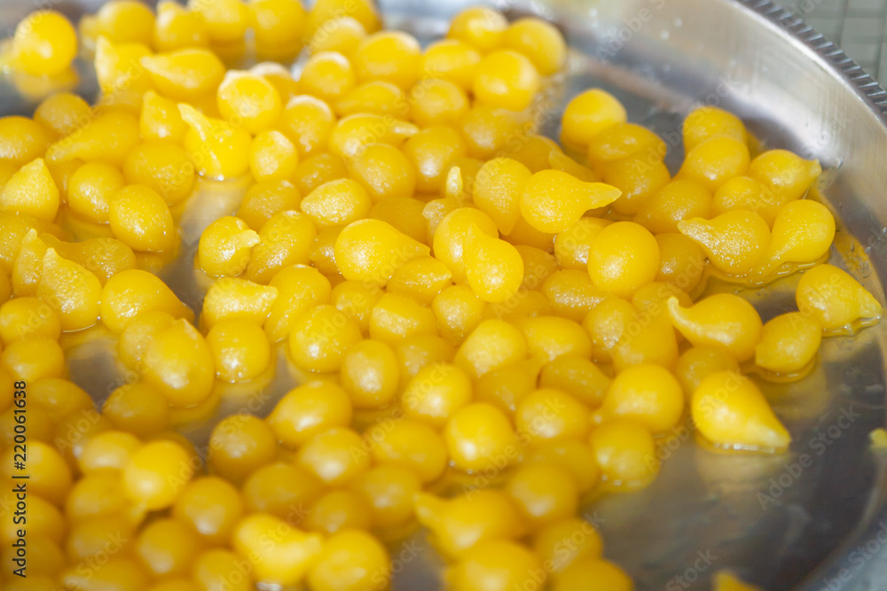 Egg Yoke fudge balls cooked in syrup. Egg Yoke fudge balls cooked in syrup.